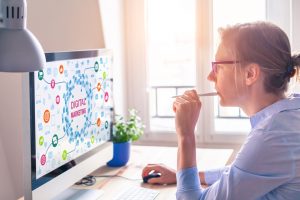 Woman trying to optimize her blog by using data analytics